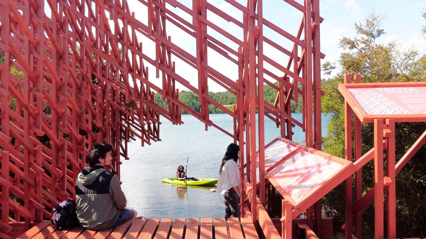 Red-painted wooden structure in Chile by Dum-Dum Lab