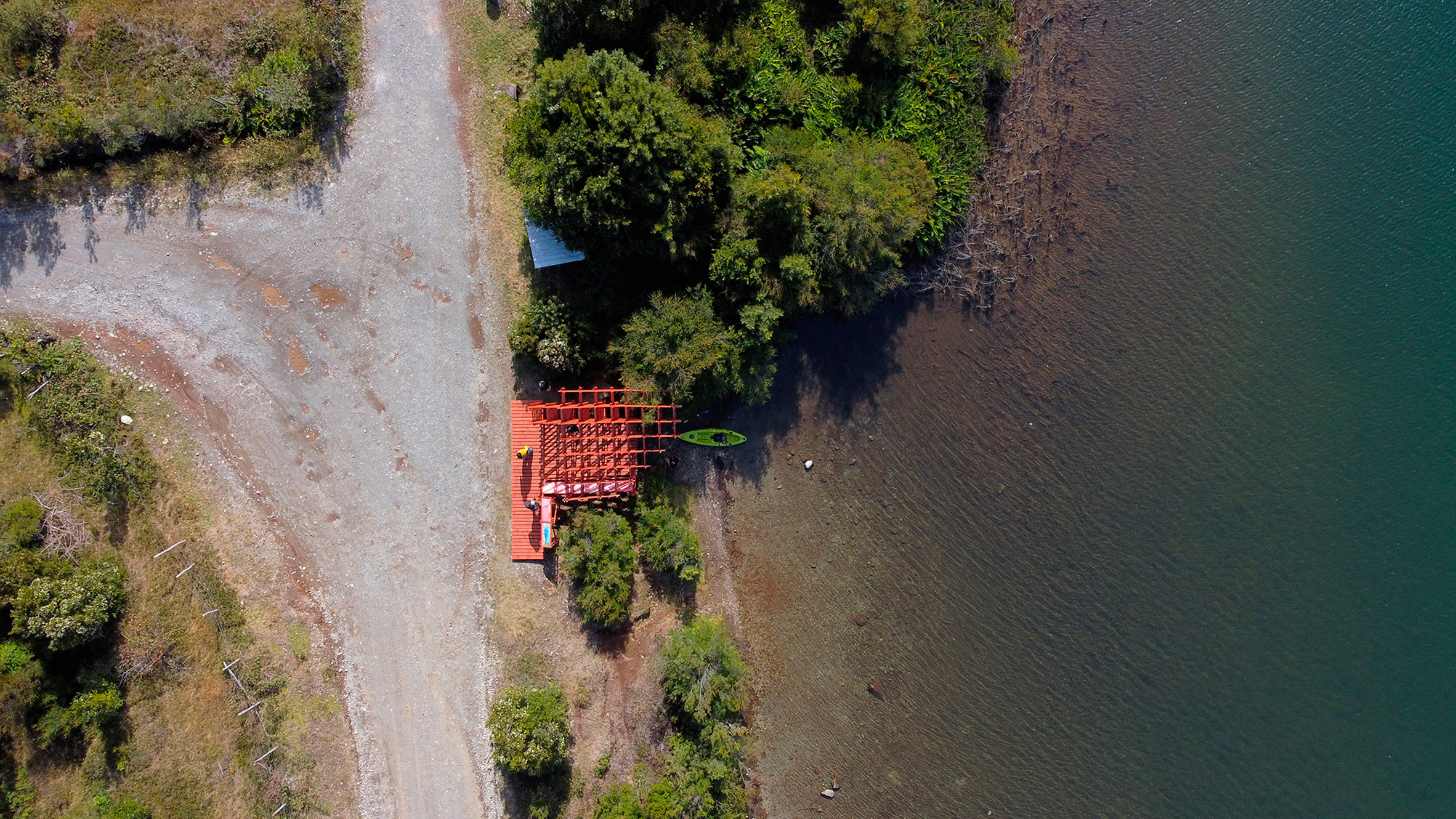 Red lakeside pavilion in Chile