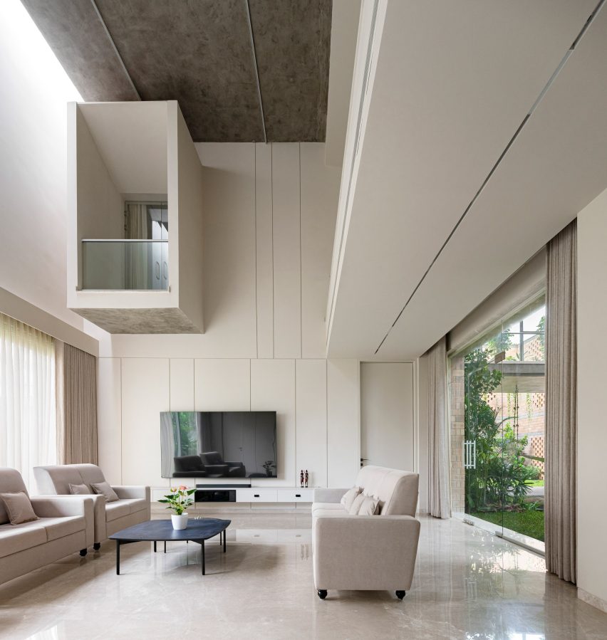 Living space interior at home by Spacefiction Studio