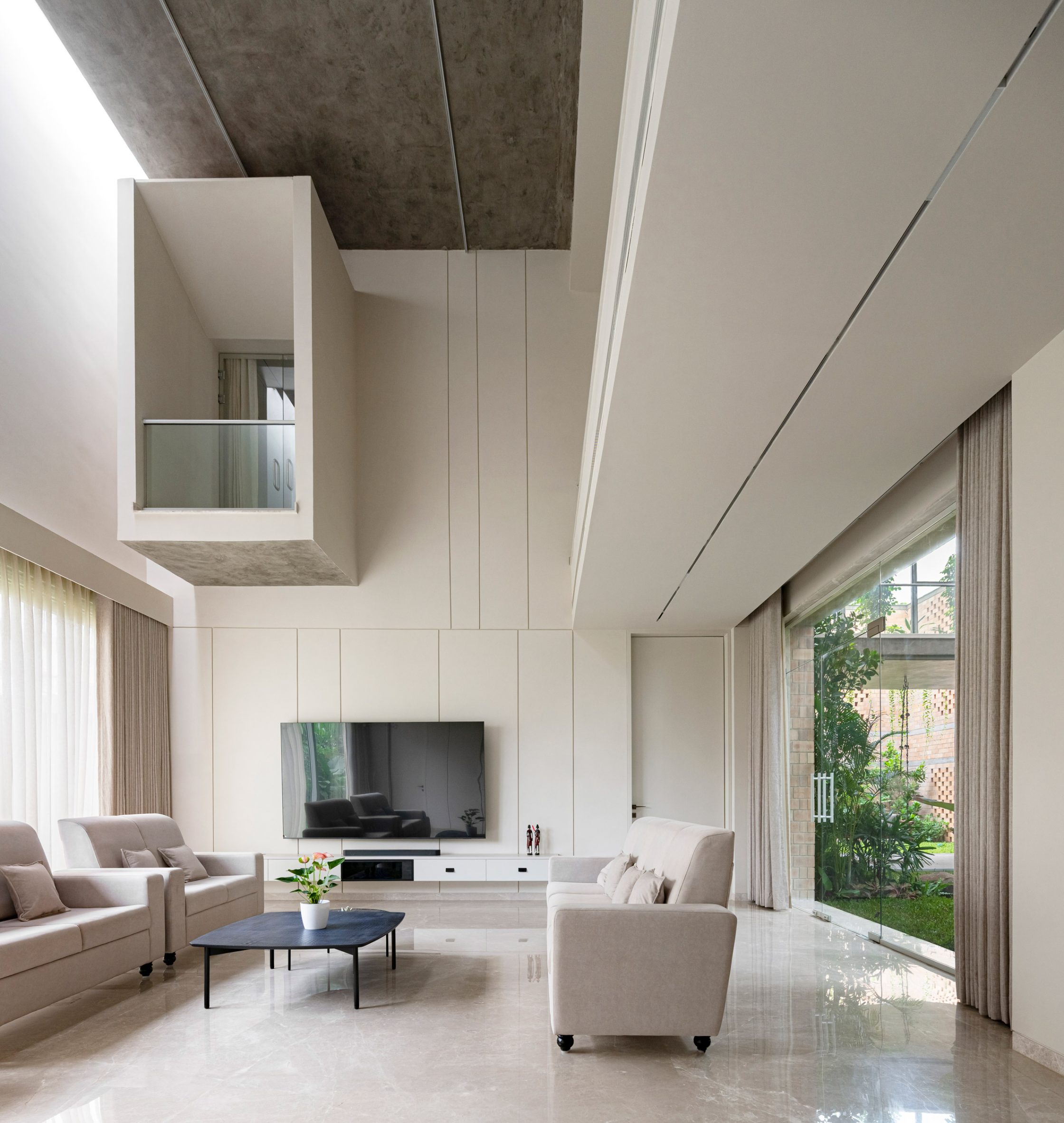 Living space interior at home by Spacefiction Studio
