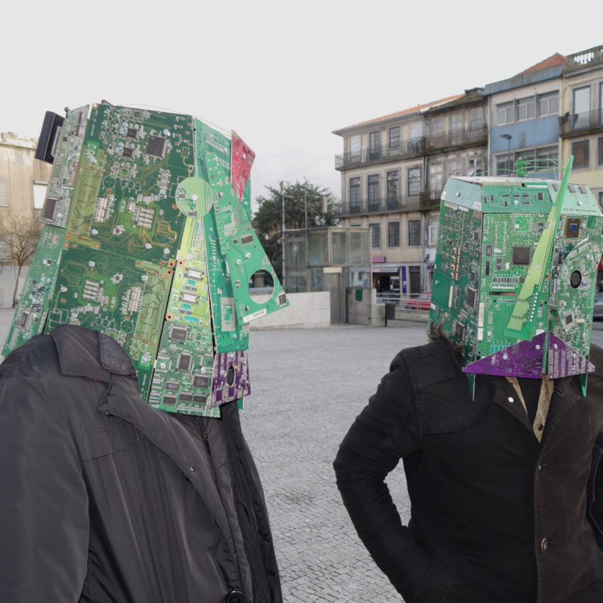 an image of people wearing green headpieces