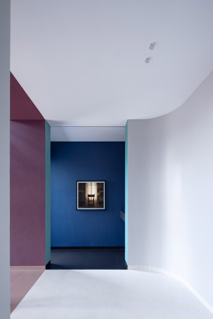 Curved walls and bold colours define Villa Corsica's interior