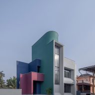Minimal windows on this sculptural home to reduces heat gain