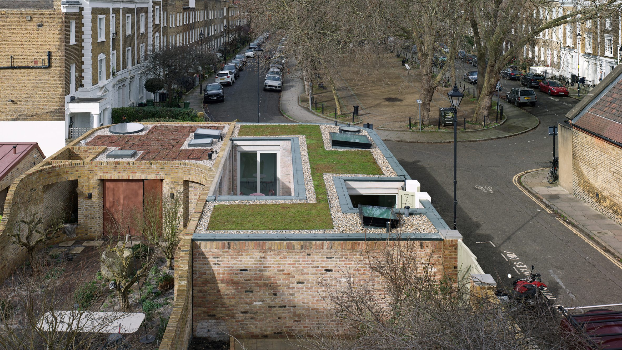 https://static.dezeen.com/uploads/2026/06/walled-courtyard-cleaver-square-hero-scaled.jpg