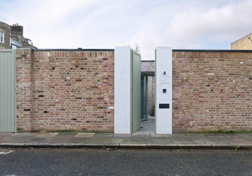 IBLA Walled Courtyard brick wall entrance