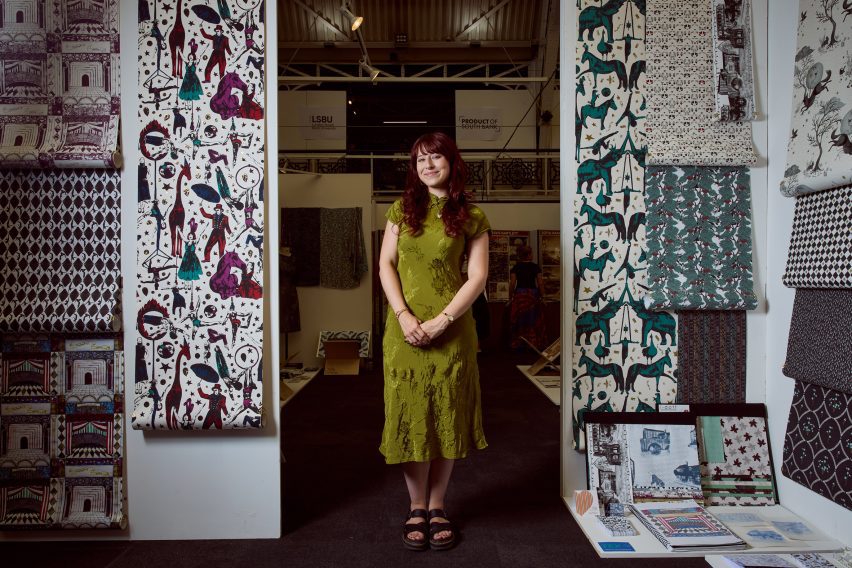 Photo of designer with fabric