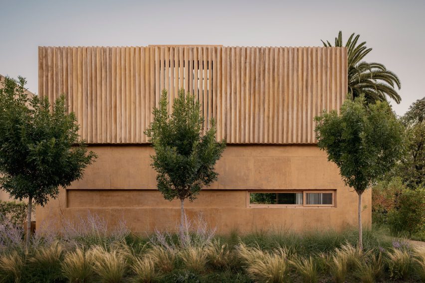 Sandy concrete house with screens