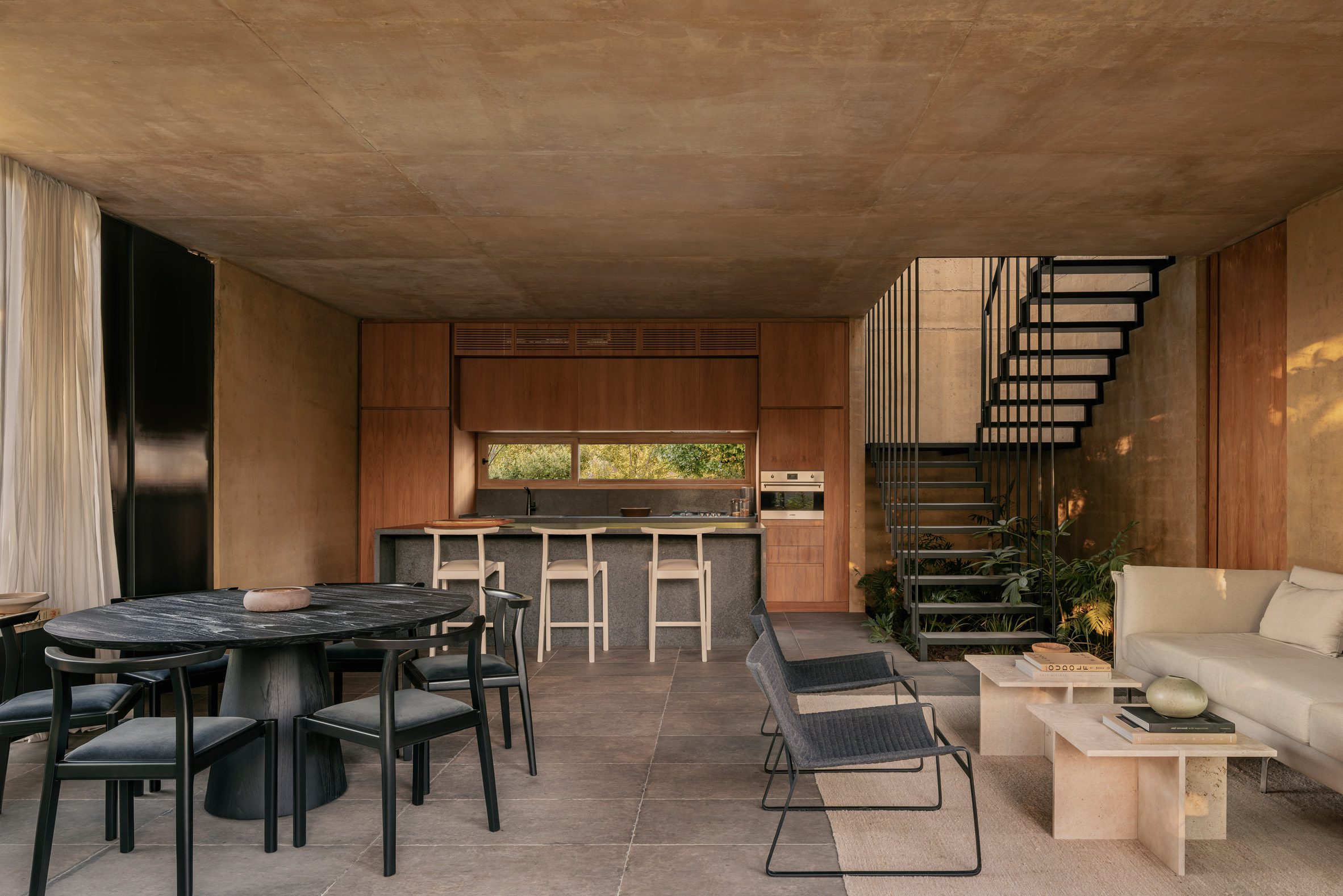 Interior of Argentina house with plants under the stairwell