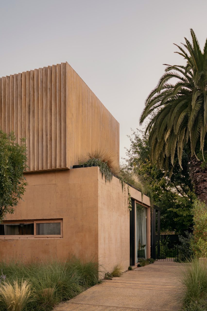 Sandy concrete house with screens