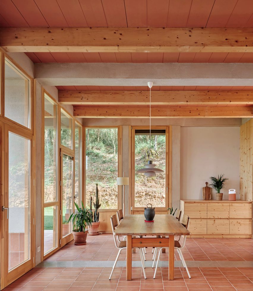 Casa Juià by NUA arquitectures uses timber, cement and lime mortar