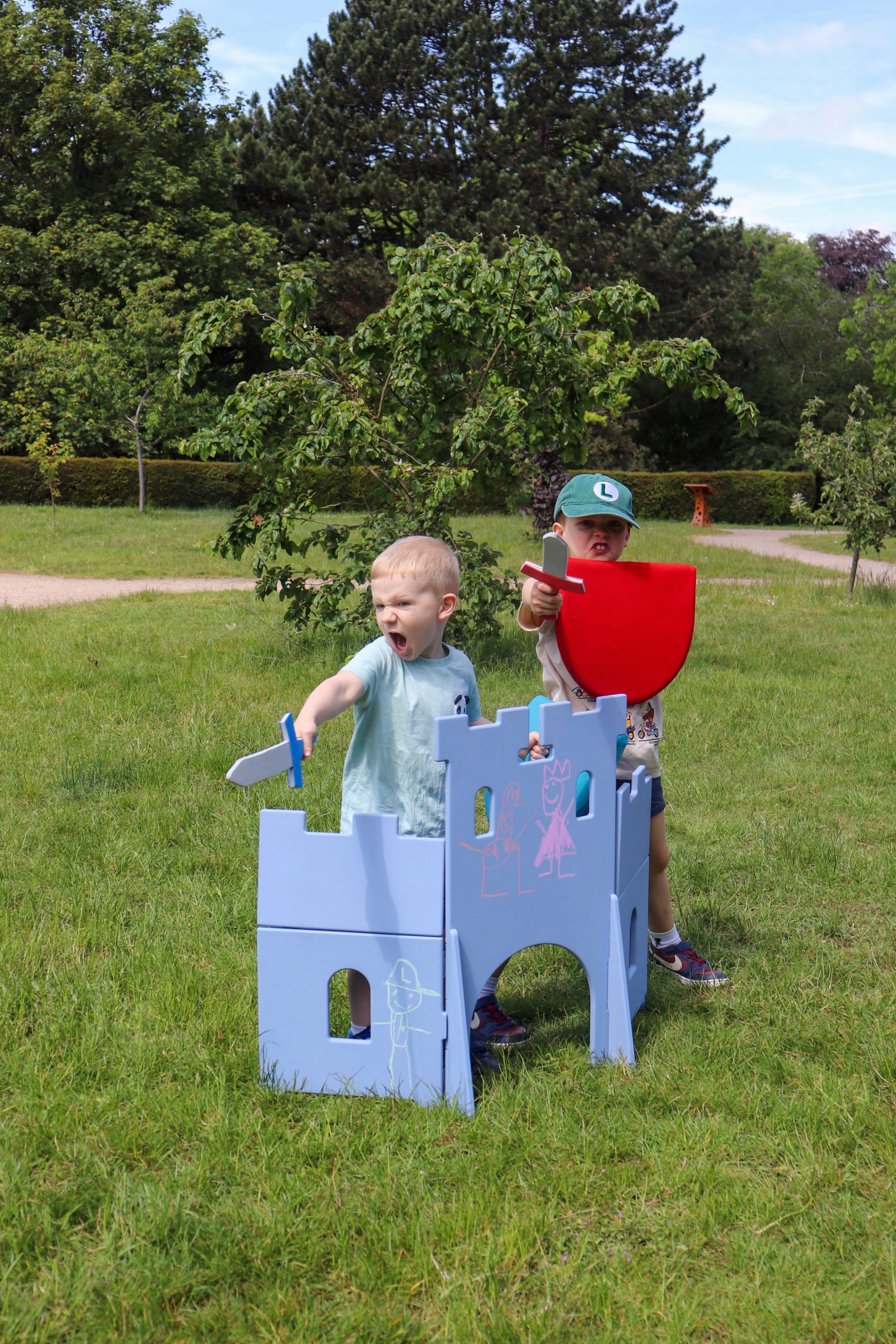 Two boys playing with a Casul chair by James Murphy