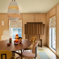 colourful carpet in dining room in Cinderella House by YSG Studio in Redfern Sydney