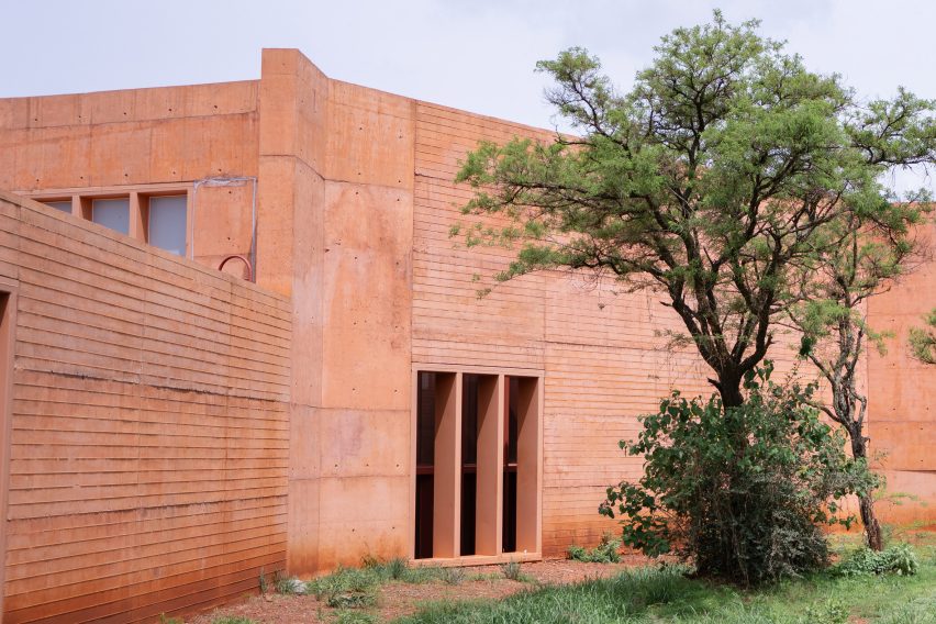 Red-tinted concrete at Clase Azul La Hacienda