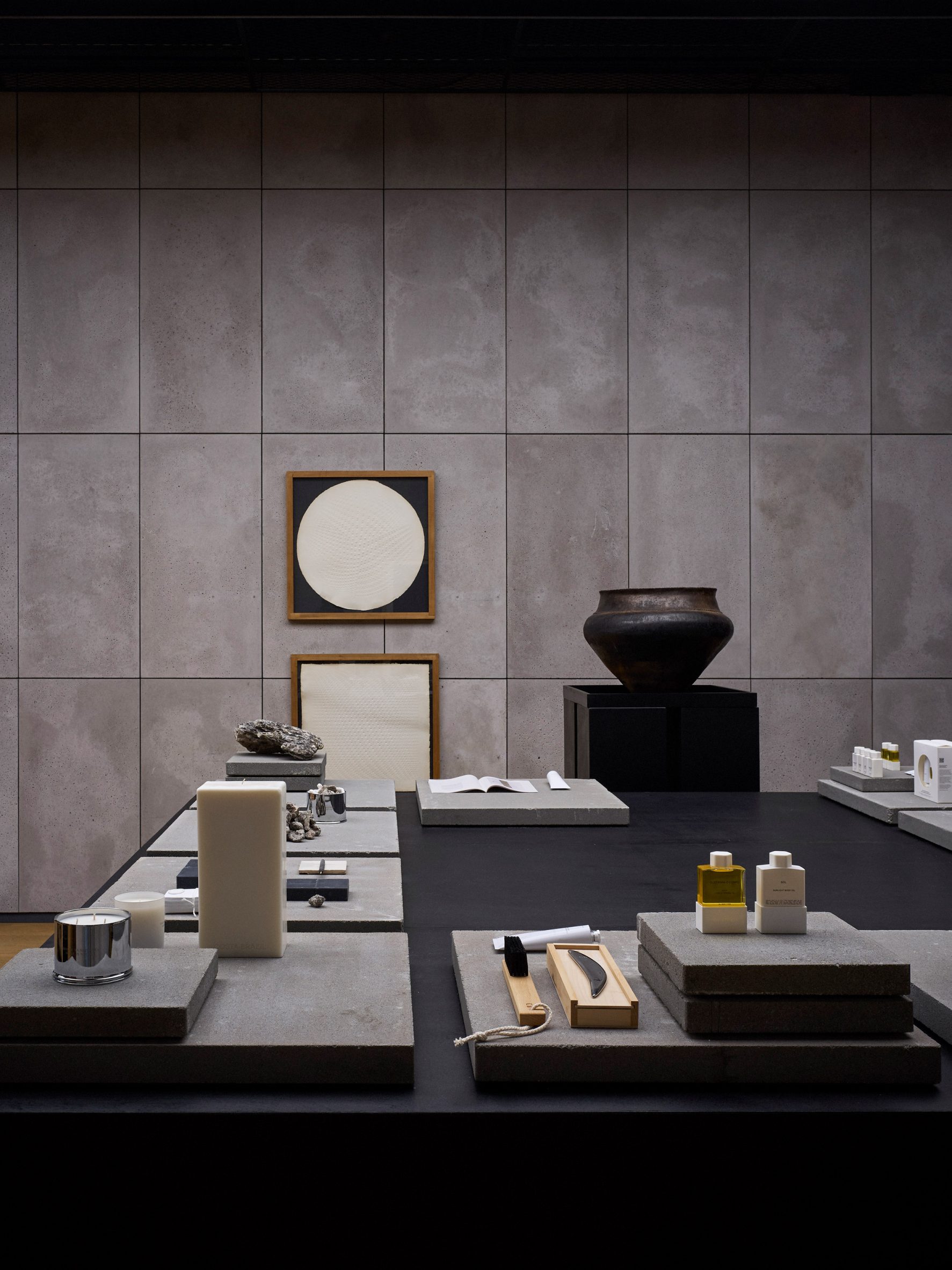 Costa Brazil products and collected items displayed on concrete plates