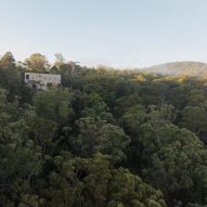 EA House by Bokey Grant on top of rocky cliff face
