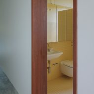EA House by Bokey Grant yellow bathroom