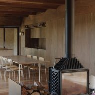 EA House by Bokey Grant fireplace and dining area