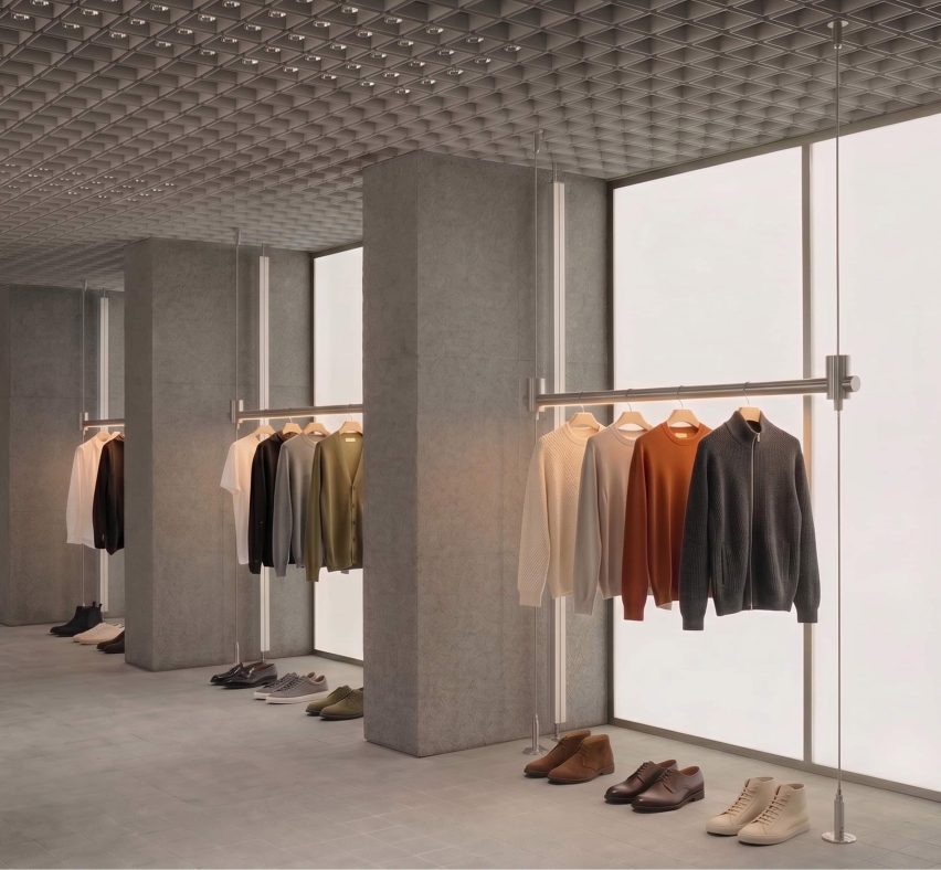 Visualisation of a retail interior with clothes hanging on rails
