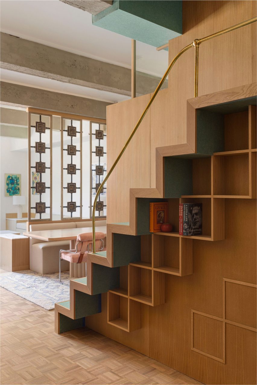 Staircase with oak millwork storage underneath