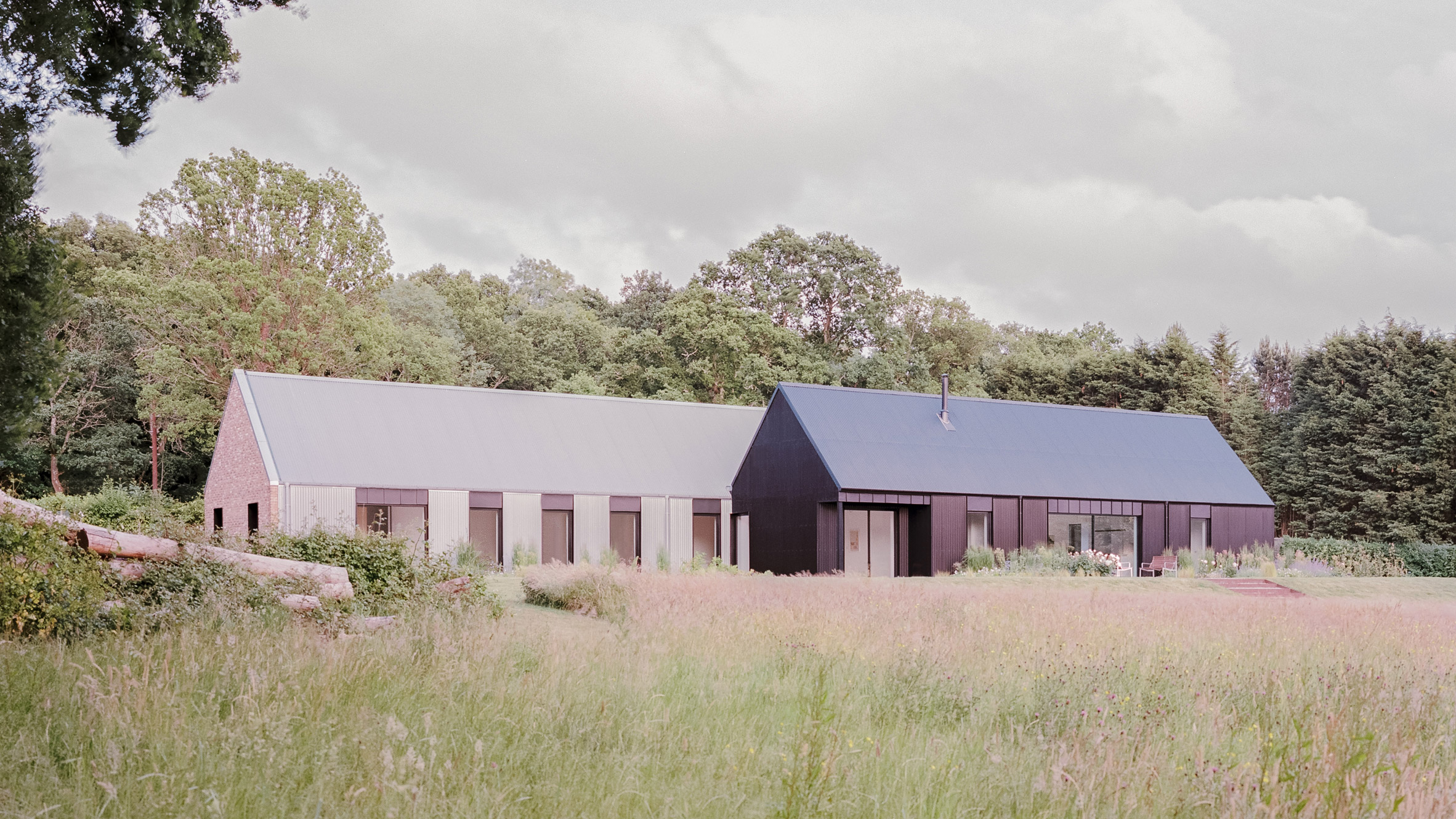 https://static.dezeen.com/uploads/2026/07/house-in-a-clearing-sussex-uk-taylorhare-architects-hero_dezeen_2364_col_0.jpg