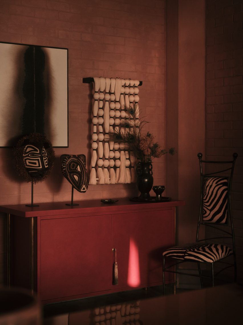 Mask and zebra-print chair in London office