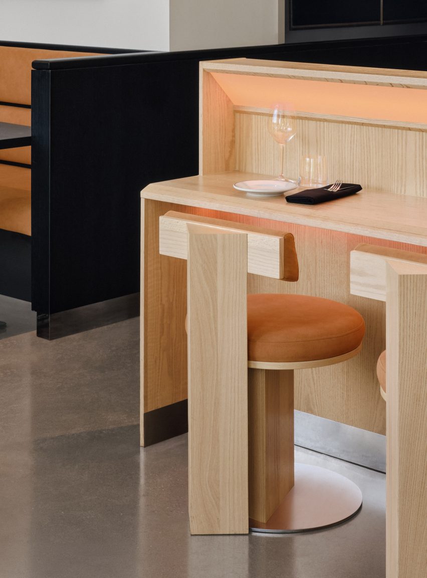 Omakase-style bar and accompanying chairs crafted from white oak