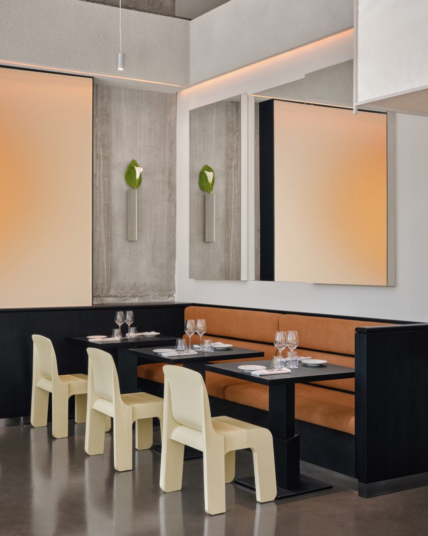 Restaurant with a largely monochromatic palette, evoking a Japanese minimalist aesthetic