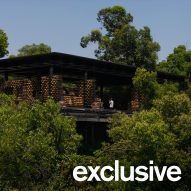 Rearrangeable cedar logs fill walls of Nanhai Buddha Pavilion in China by DoDesign
