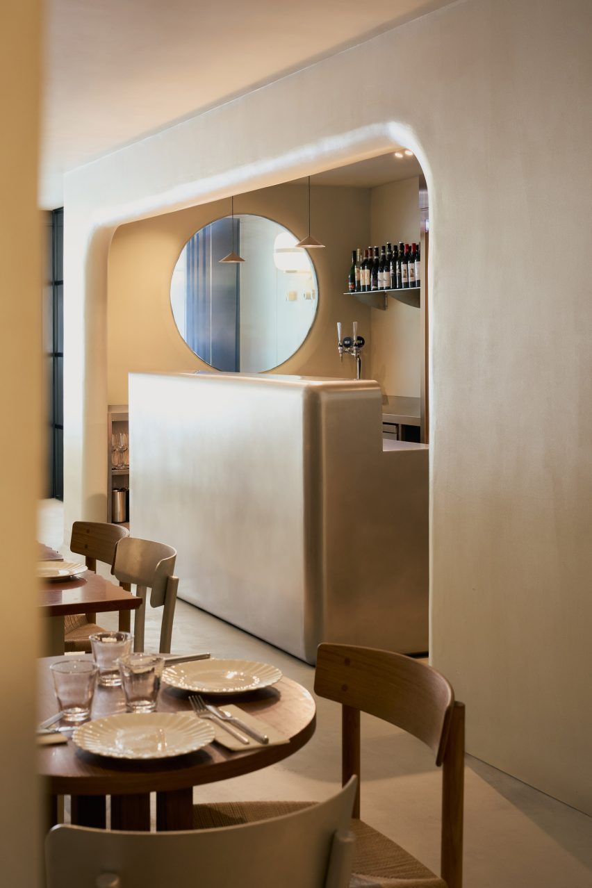 Rounded arch and metal bar counter