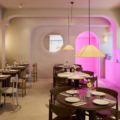 Pizza restaurant with pink-lit space