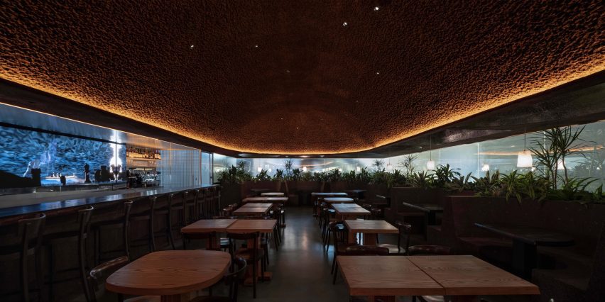 Dark, moody interior of Oberon restaurant