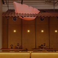 Open Studio designs izakaya-style restaurant with "half-dipped dumpling" lamp