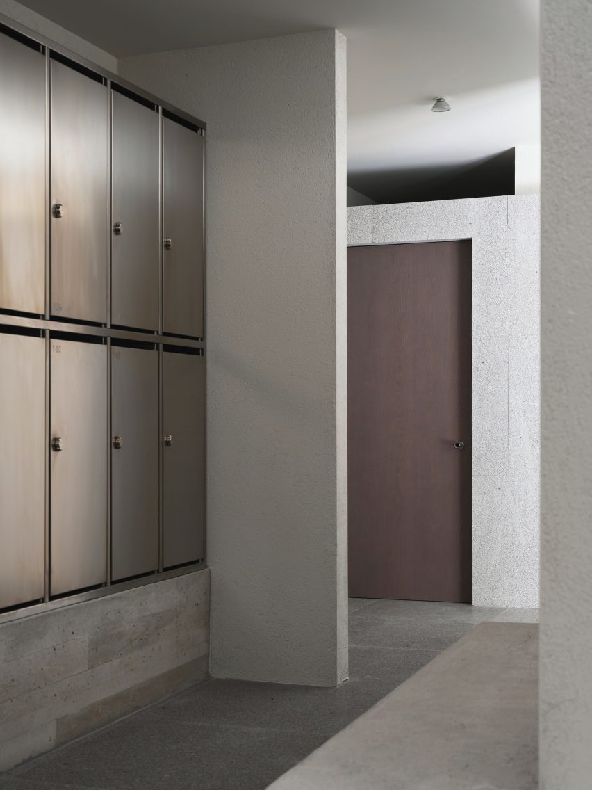 Door of changing room with metal lockers