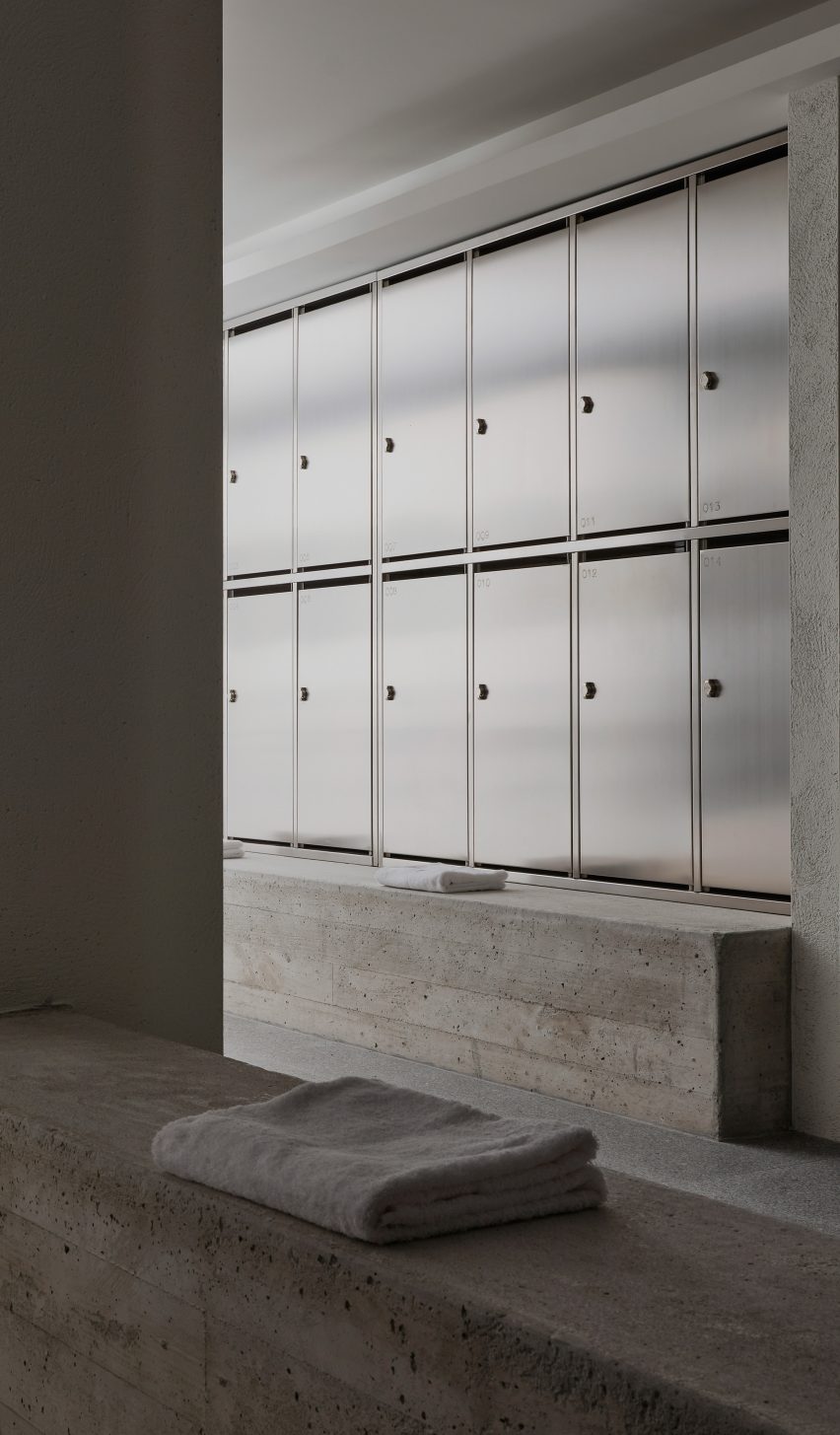 Concrete benches in factory changing rooms in San Sebastian by Ortega Diago