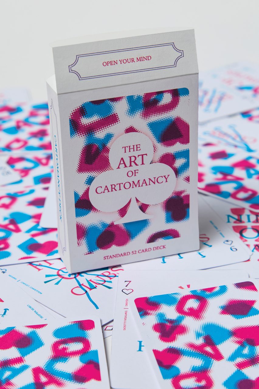 Playing card box decorated with blue and pink symbols
