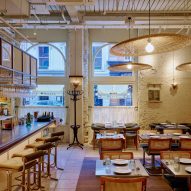 Stone and lace details "evoke the atmosphere of Cyprus" at London restaurant Zylia