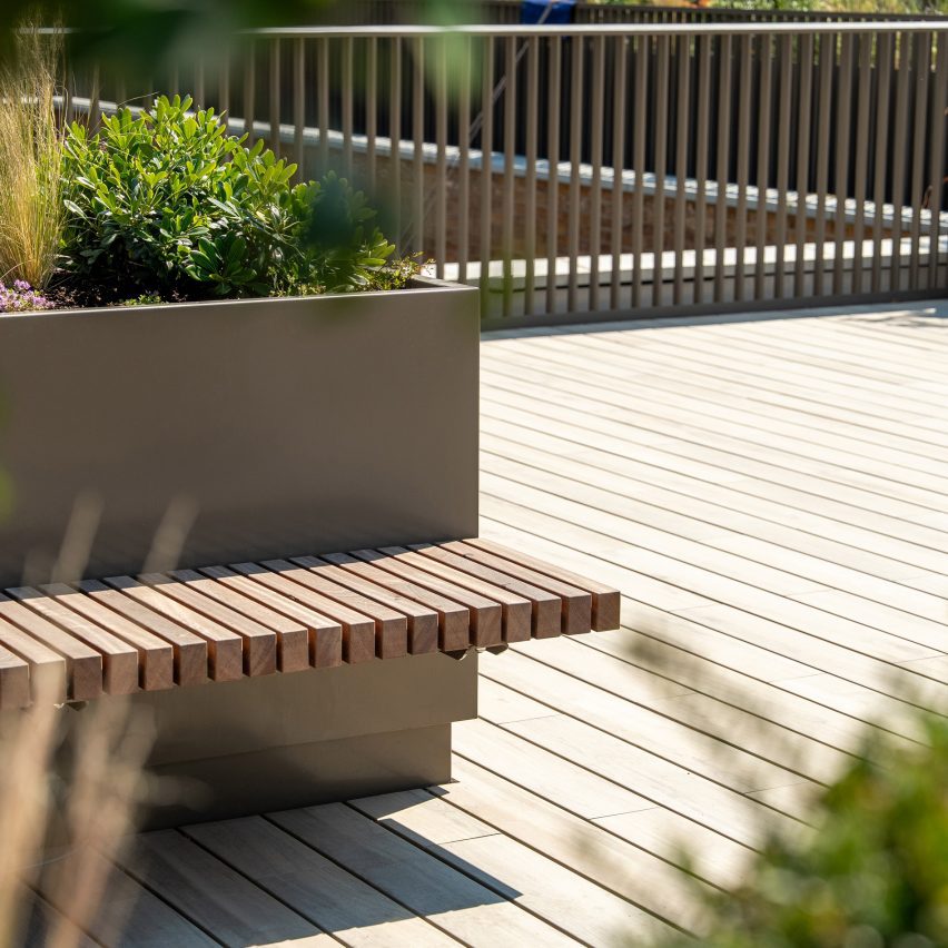 a rooftop terrace with seating