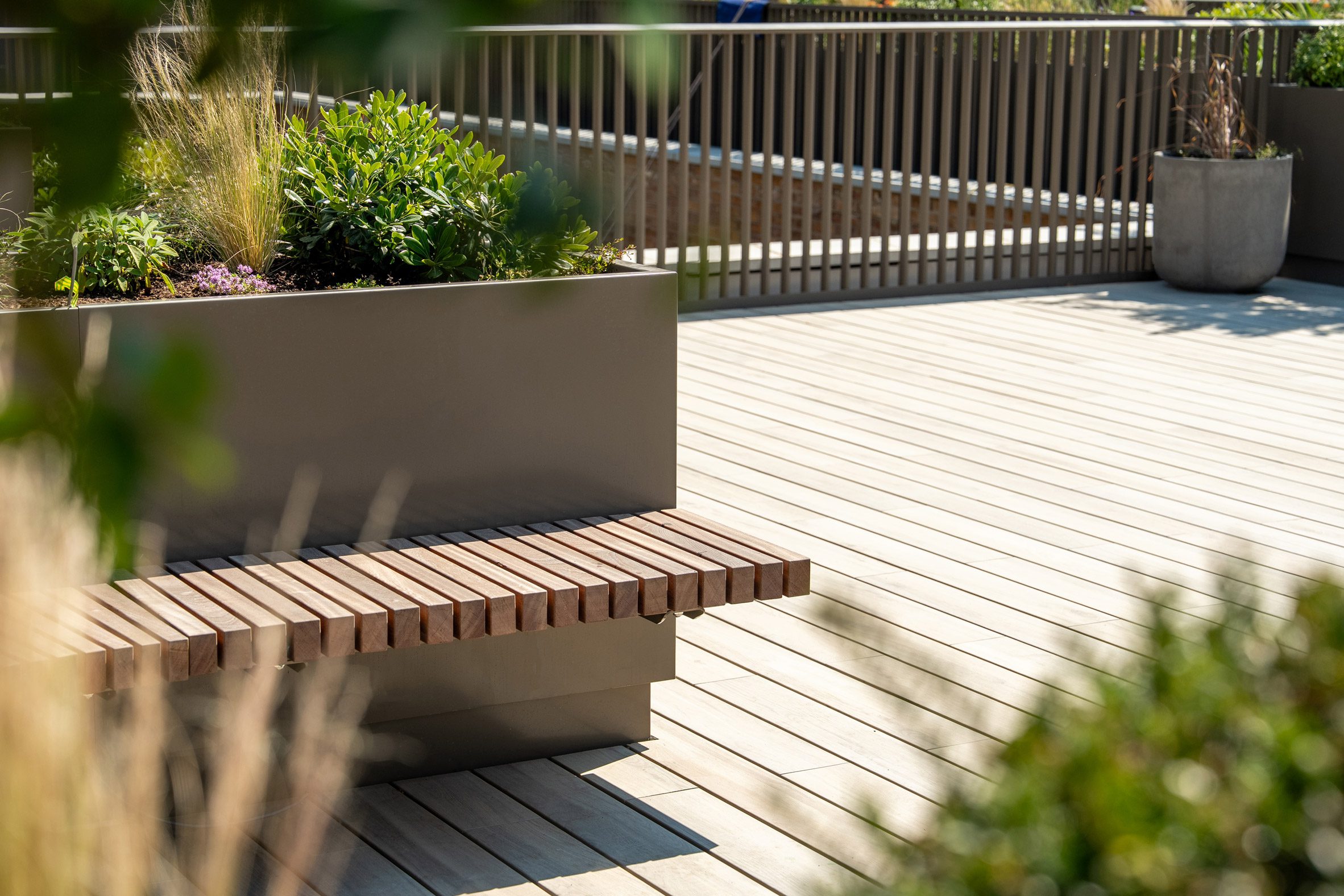 a rooftop terrace with seating
