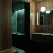 BoND designs "dark and enveloping" private sauna in New York