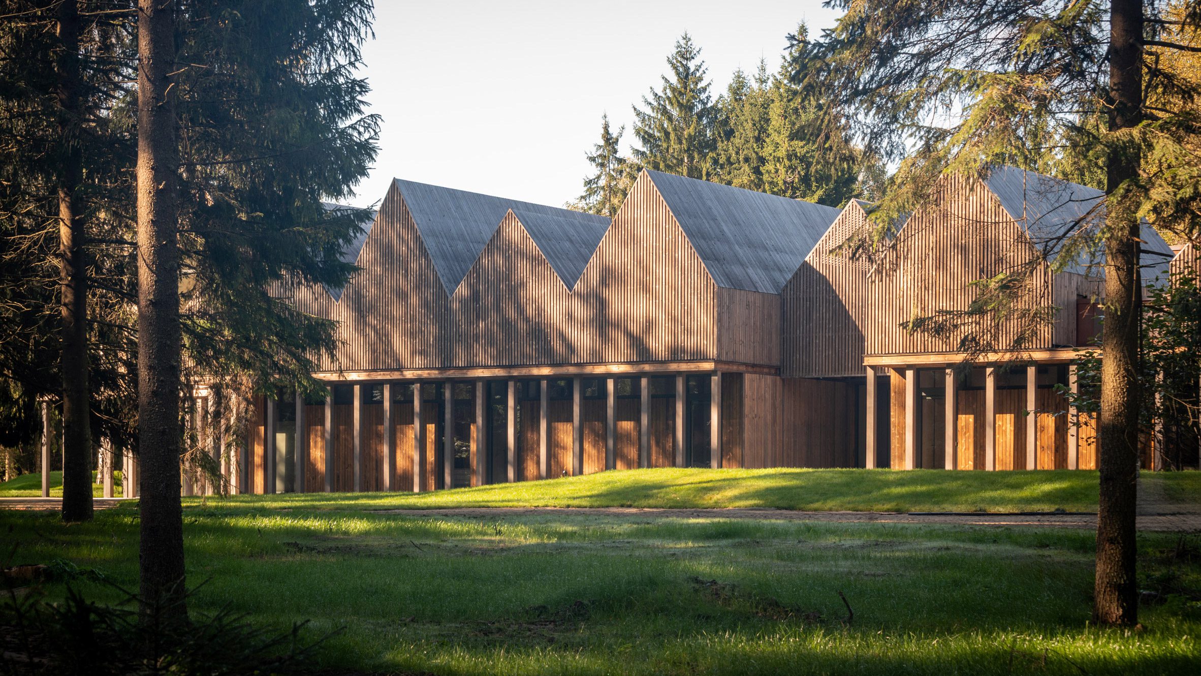 https://static.dezeen.com/uploads/2026/07/sanctum-nature-therapy-retreat-arches-architecture-lithuania-public-leisure_dezeen_2364_hero.jpg