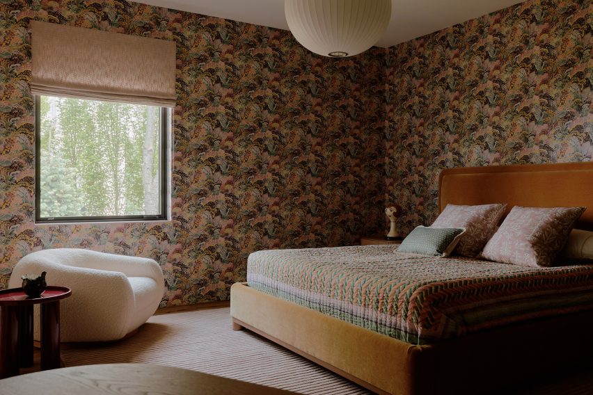 Bedroom with patterned wallpaper in the USA
