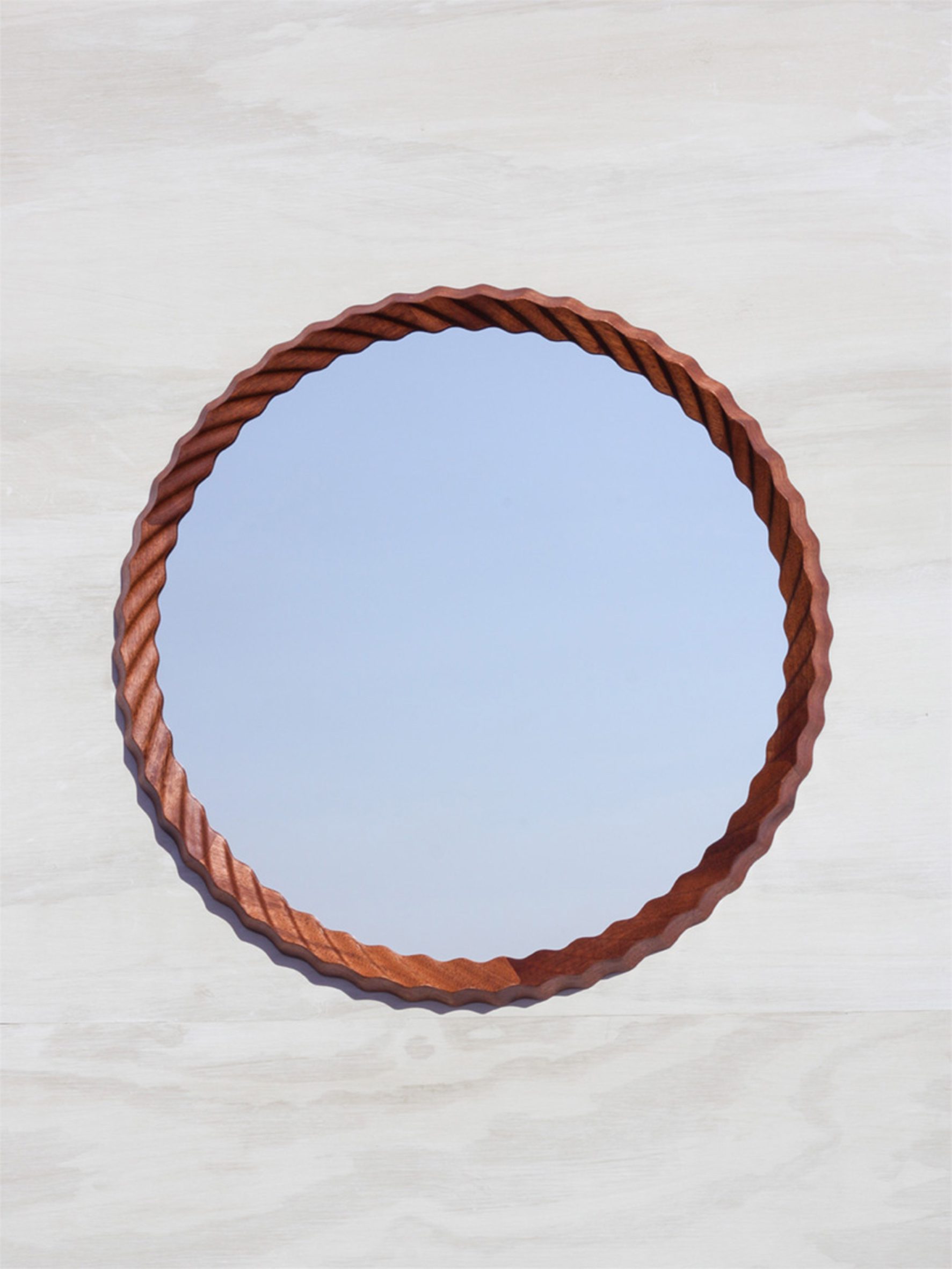 Mirror with wavy frame