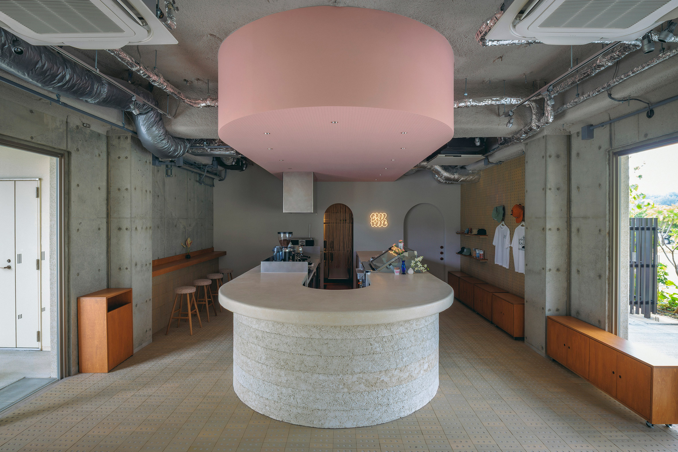 Pink ceiling above cafe counter