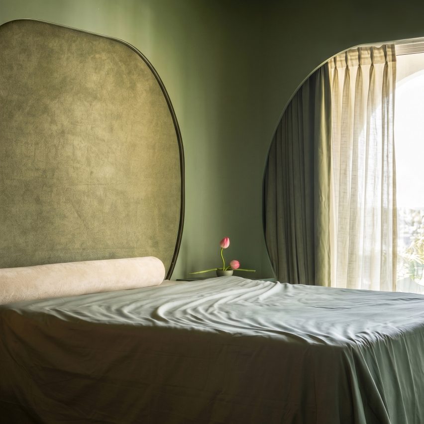 Mumbai apartment designed to feel like "arriving at the edge of a still body of water"