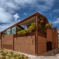 Ant&oacute;nio Costa Lima Arquitectos completes warehouse-style housing block in Lisbon