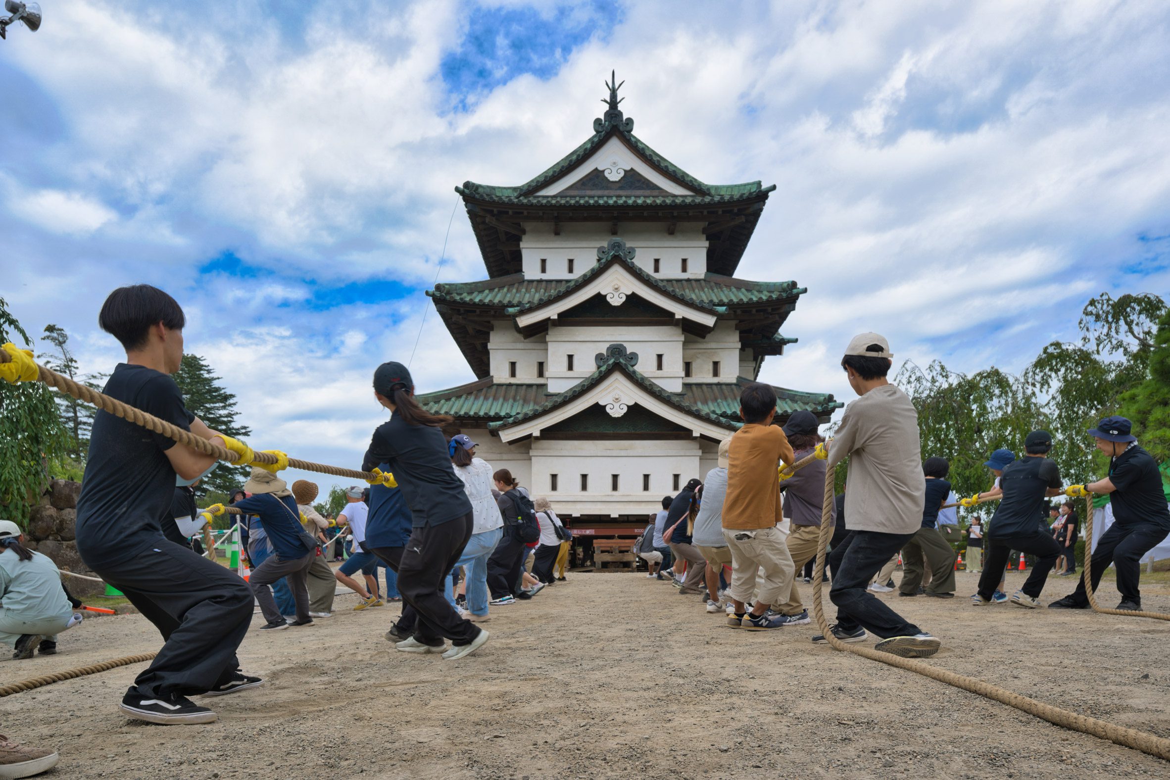 Hirosaki Castle pulled by volunteers in Japan