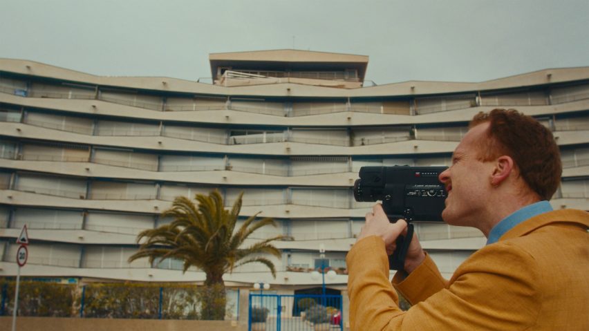 an image of a person taking a photograph