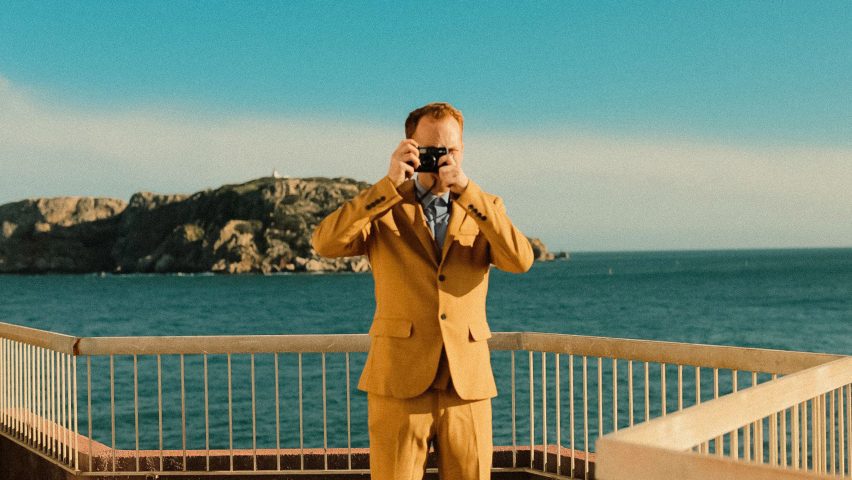 an image of a person taking a photograph