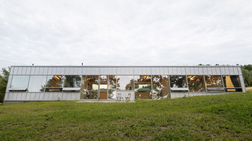 Modular home with sloping facade by Papundekl Architects