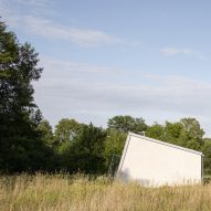 Modular home with sloping facade by Papundekl Architects